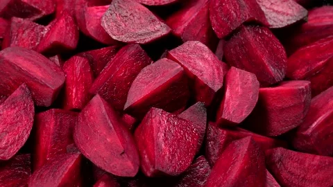 Fresh red beetroot slice rotation background Stock Footage 169512485
