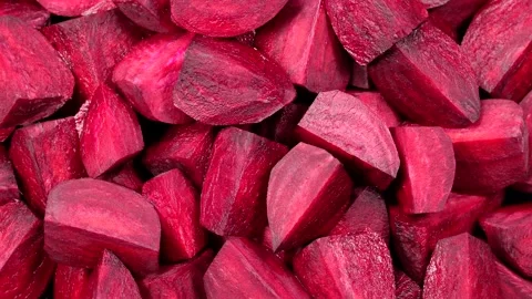 Fresh red beetroot slice rotation background Stock Footage 169512556