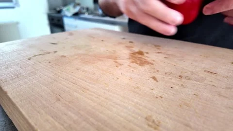 Fresh red bell pepper presented before preparation Stock-Footage 345494240