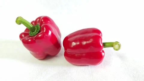 Fresh red bell peppers on a white background. Stock Footage 340720525