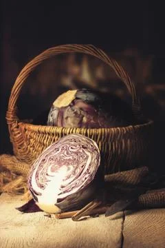 Fresh red cabbage on a table in a warm kitchen Stock Photos