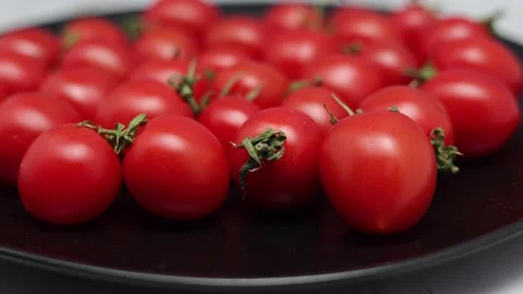 Fresh Red Cherry Tomatoes On A Black Plate. Dolly In. Slider Shot. Stock Footage 150822777