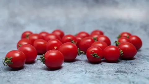Fresh Red Cherry Tomatoes On A Blue Marble Background. Panning Dolly Slider Shot Vídeos de archivo 150901181