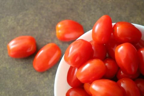 Fresh red cherry tomatoes close up Stock Photos