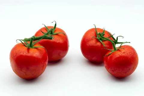 Fresh red cherry tomatoes isolated on white background. Stock Photos