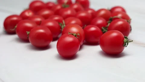 Fresh Red Cherry Tomatoes On A Marble Background. Dolly Slider Shot. Close Up Stock Footage 150898795
