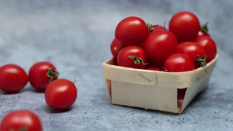 Fresh Red Cherry Tomatoes In Tray For Sale On A Blue Marble Background. Zoom In  스톡 동영상 150900493