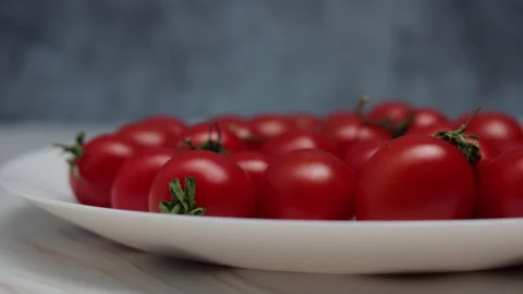 Fresh Red Cherry Tomatoes On A White Plate. Panning Dolly Slider Shot. Close Up. Stock Footage 150822869