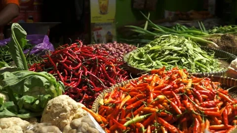 Fresh red chilli and vegetables for sale at Pasar Pakem traditional market Stock Footage 201317009