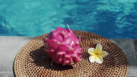 Fresh red dragon fruit with drops of clear water Stock Footage 154482844