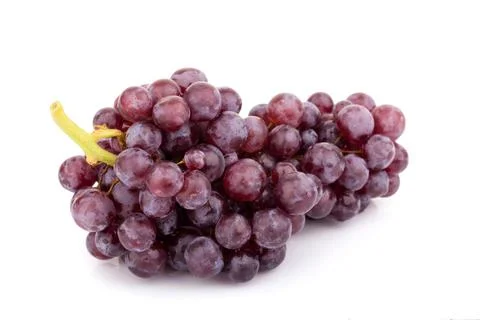 Fresh red grape on white background Stock Photos