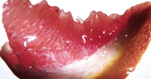 Fresh red grapefruit slice close up. Stock Footage 330691629