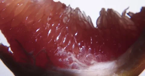 Fresh red grapefruit slice close up. Stock Footage 330691635