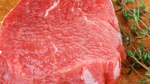 Fresh red meat : two raw beef fillet chops Vídeos de archivo 29999502