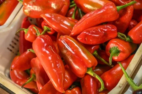 Fresh red peppers at the local vegetable market 2 Stock Photos