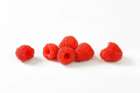Fresh red raspberries on clean surface Stock Photos