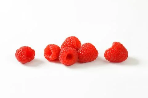 Fresh red raspberries on clean surface Stock Photos