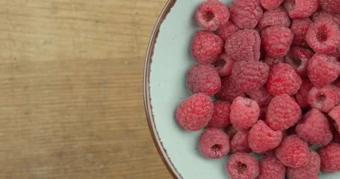 Fresh red raspberries closeup rotating loopable Stock Footage 143454833
