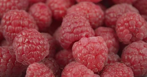 Fresh red raspberries closeup rotating Stock Footage 156201053