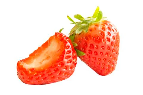 Fresh red strawberry bite a half isolated Stock Photos