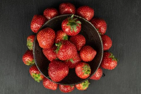 Fresh red strawberry on grey stone 스톡 사진