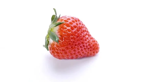 Fresh red strawberry rotating on white background Stock-Footage 332911289