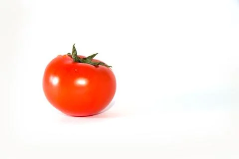 Fresh red tomato with green stem on white background Stock Photos