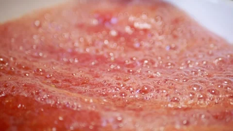 Fresh Red Tomato Juice Texture With Foamy Bubbles Surface Close Up Stock Footage 330117276
