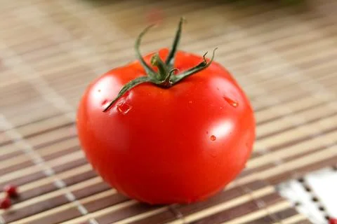 Fresh red tomato on table Stock Photos