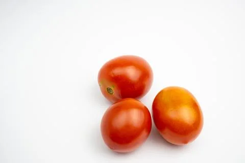 Fresh red tomatoes. in Groups. isolated on white background. Stock Photos