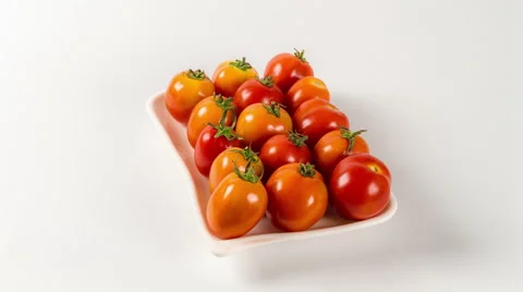 Fresh red tomatoes in tray close up rotation 4K Stock Footage 50236597