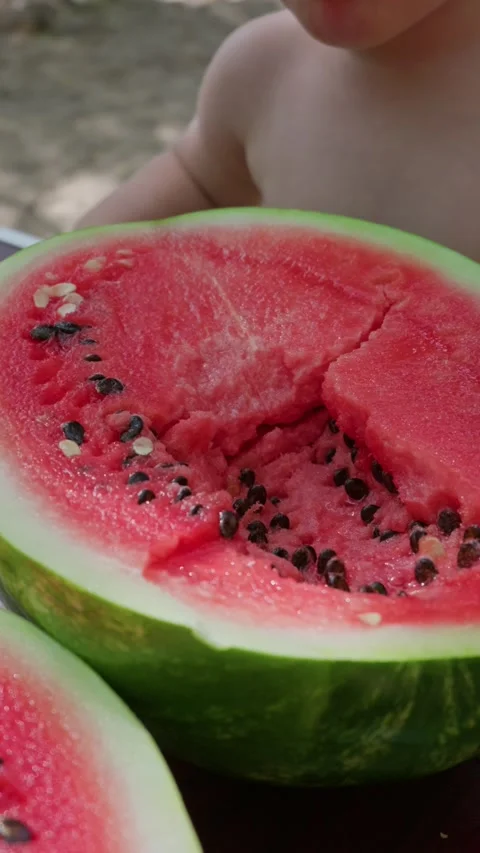 Fresh Red Watermelon Half Served Outside as Refreshing Summer Healthy Snack Stock Footage 341995616