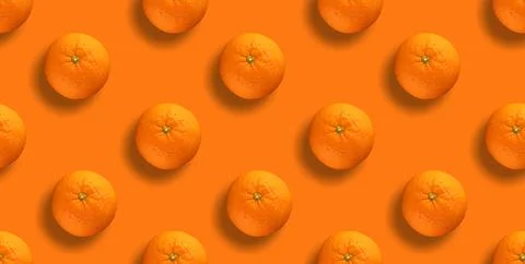 Fresh repeating orange fruit on orange background Stock-Fotos