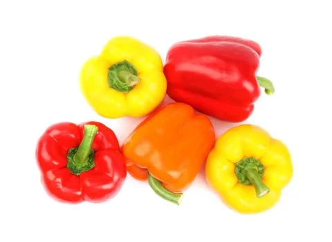 Fresh ripe bell peppers on white background, top view Stock Photos