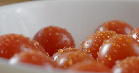 Fresh ripe cherry tomatoes in bunch preparing for cooking Stock Footage 122312026