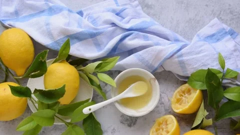 Fresh ripe lemons on the table, preparing lemon juice, food background Stock-Footage 157665920