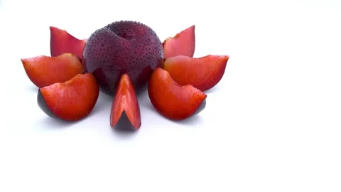 Fresh Ripe Plum Cut in Half with Juicy Slices Food Animation in 4K Stock Footage 332814406