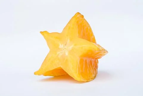 Fresh Ripe Starfruit Slice Isolated on White Background 库存照片