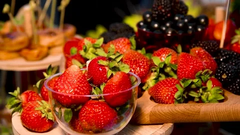 Fresh, ripe strawberries on the table Stock Footage 305988104