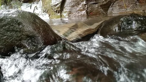 Fresh River Stream Flowing Through Rocks in Nature Stock Footage 330336051