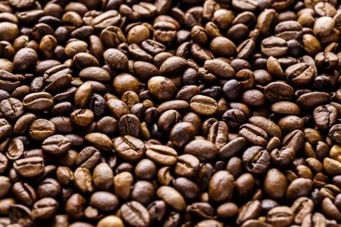 Fresh roasted coffee bean background. Background of roasted coffee beans, top Stock Photos