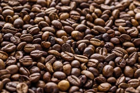 Fresh roasted coffee bean background. Background of roasted coffee beans, top Stock-Fotos