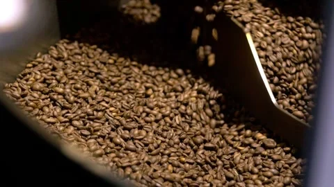 Fresh Roasted Coffee beans in coffee roasting machine Stockbeeldmateriaal 136947214