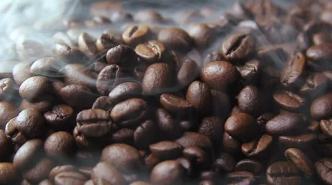 Fresh roasted coffee beans letting off steam as they cool down. Stock Footage 59305199