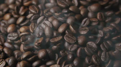 Fresh roasted coffee beans letting off steam as they cool down. Stock Footage 59305206