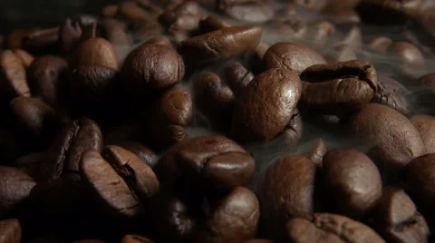 Fresh roasted coffee beans letting off steam as they cool down. Stock Footage 59305279