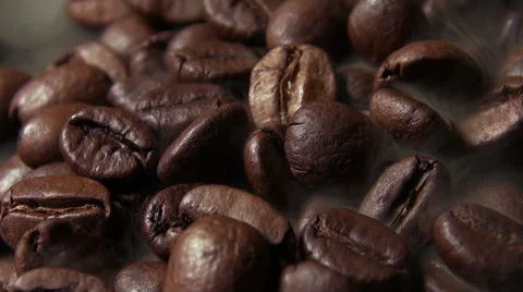 Fresh roasted coffee beans letting off steam as they cool down. Stock Footage 59305280