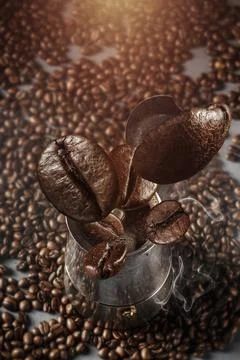 Fresh roasted falling coffee beans concept Stock Photos