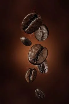 Fresh roasted falling coffee beans concept Stock Photos