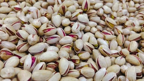 Fresh roasted pistachios in shell, horizontal view Stock Footage 345156505